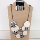 Black Adjustable Wax Cord Necklace with Black and White Round Wood and Resin Accents